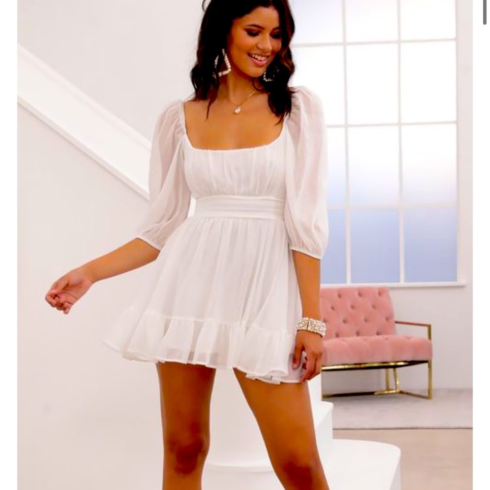 The Neia ruffle dress by LUCY IN THE SKY